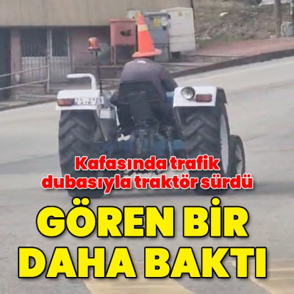 Trafik dubası kafasında traktör sürdü