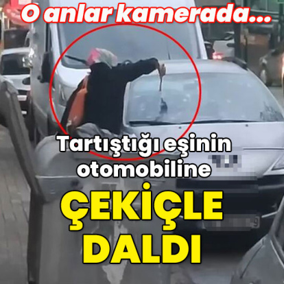 O anlar kamerada... Tartıştığı eşinin otomobiline çekiçle daldı