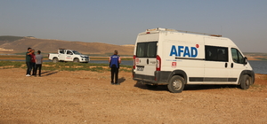 Hatay'da baraj gölüne giren iki kardeşten biri boğuldu