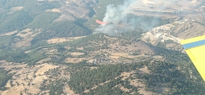 İzmir Kınık'ta çıkan orman yangınına karadan ve havadan müdahale ediliyor