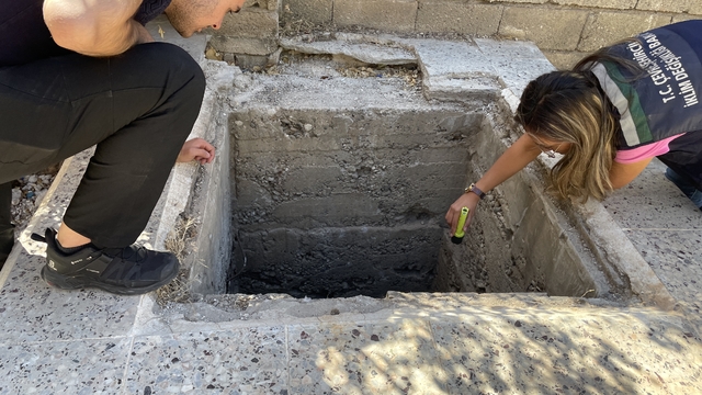 Gaziantep'te ağır hasarlı binanın su kuyusuna düşen kedi yavrusu kurtarıldı