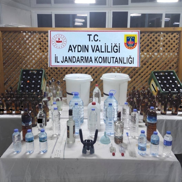 Aydın'da sahte içki imal ettiği öne sürülen 2 şüpheli yakalandı