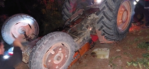 Savaştepe'de devrilen traktörün altında kalan çiftçi hayatını kaybetti