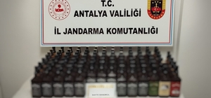 Antalya'da yolcu otobüsünde 93 litre kaçak içki ele geçirildi
