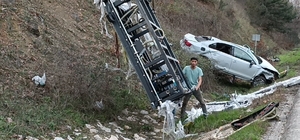 Bursa'da tırla çarpışarak takla atan otomobildeki 2 kişi yaralandı