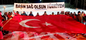 Sarıkamış’ta şehitler için "meşaleli saygı kayağı"