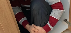 Bursa'da firari FETÖ'cü saklandığı mutfak dolabında yakalandı