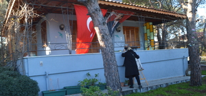 Gazeteci yazar Uğur Mumcu, ölümünün 31. yılında Ayvalık'taki evinin önünde anıldı