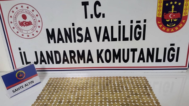Salihli'de sahte sikkelerle dolandırıcılık şüphesiyle 2 gözaltı