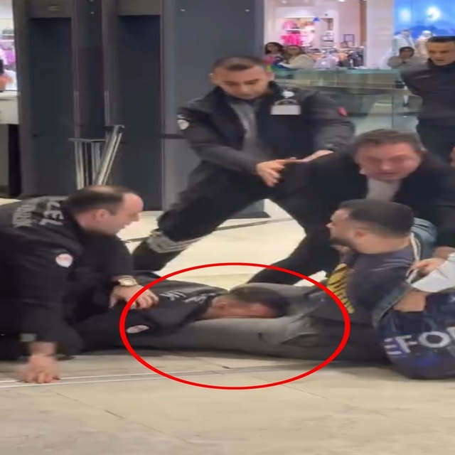 Isırıklı kavga, köpeğini kucağında AVM'ye sokmak isteyince çıkmış