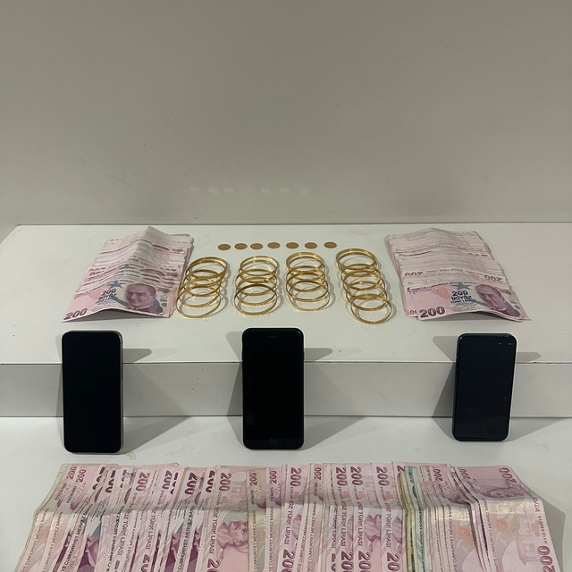 Bursa'da telefonda oğlu olduğuna inandırdığı kadını dolandıran zanlı ile ar...