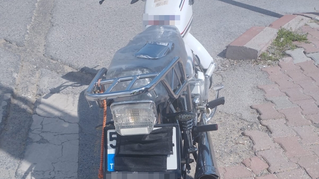 Nevşehir'de motosikletinin plakasını maske ile kapatan sürücüye para cezası