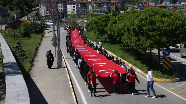 Güneysu'da bayrak yürüyüşü düzenlendi