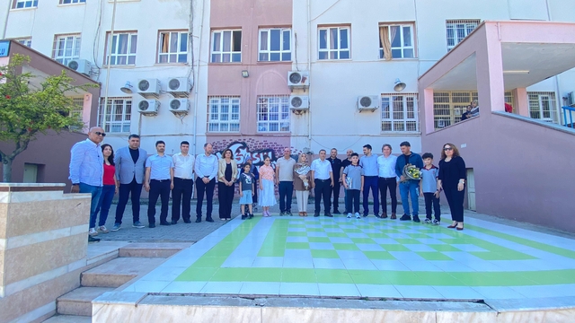 Kozan'da bursluluk sınavında tam puan alan 2 öğrenci ödüllendirildi