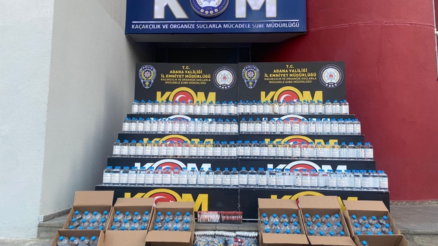 Adana'da bir ev ve 2 iş yerinde 400 litre sahte içki ele geçirildi