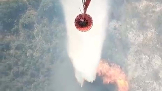 Balıkesir'de tarım arazisinden çıkıp, ormana sıçrayan yangın 2'nci gününde