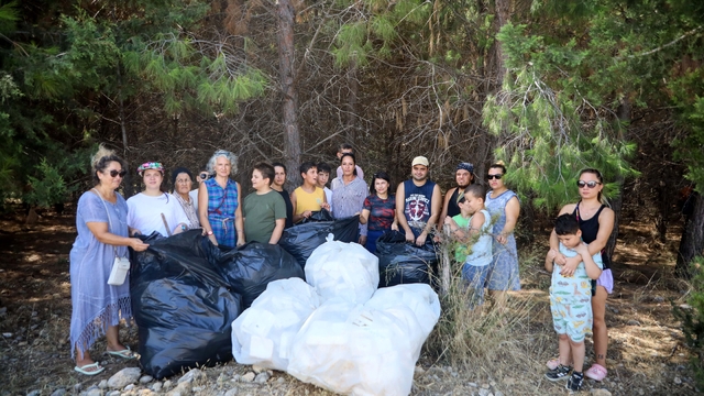 Otizmli çocuklardan yangına karşı orman temizliği
