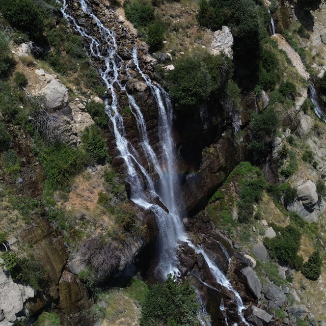 Antalya'nın kavurucu sıcaklarında Uçarsu Şelalesi serinlemek isteyenlerin a...