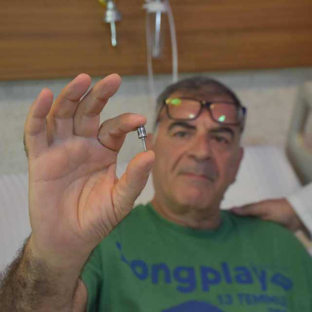 Akciğerinden diş implantı çıktı