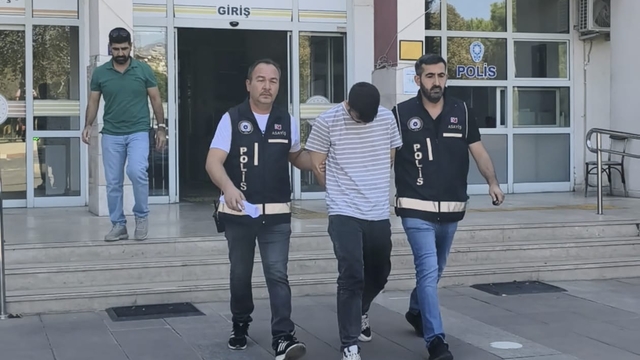 Aydın'da kendisini polis olarak tanıtıp dolandırıcılık yapan zanlı tutuklandı