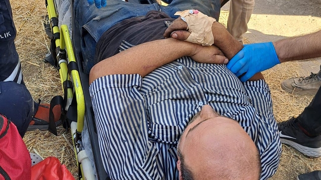 Yem karma makinesine düşen işçiyi itfaiye kurtardı