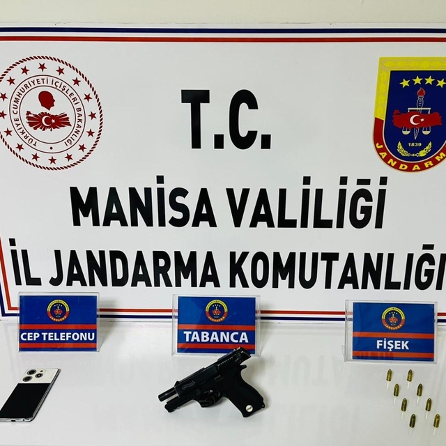 Salihli'de ruhsatsız tabancayla yakalanan şüpheliye adli işlem