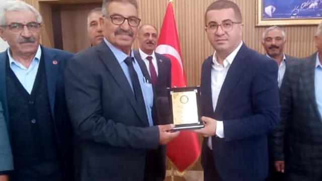 Kağızman'da muhtarlardan Kaymakam Daştan'a ziyaret