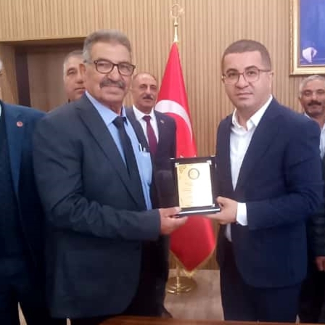 Kağızman'da muhtarlardan Kaymakam Daştan'a ziyaret