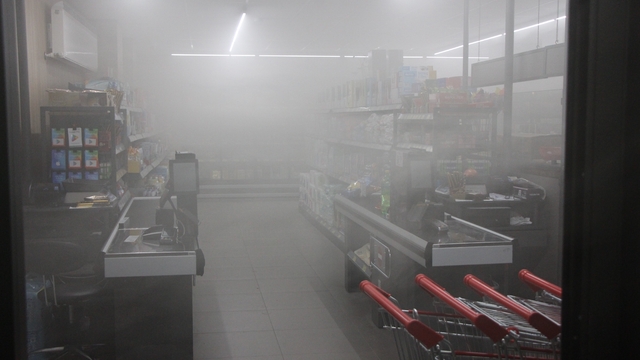 Amasya'da korkutan yangın: Marketi duman kapladı