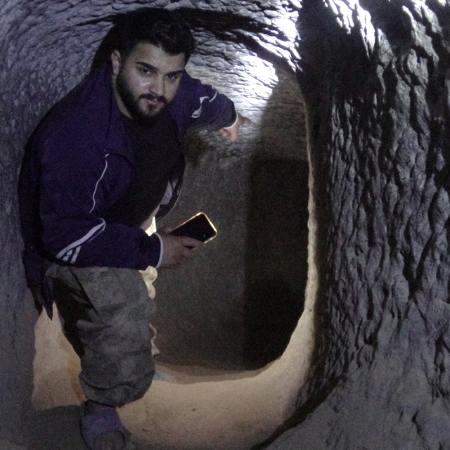 Tarihi 300'lü yıllara dayanan mahalledeki oyma mağaraların turizme kazandır...