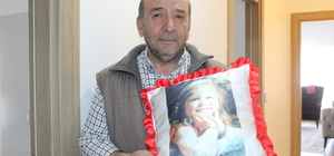 Depremde enkazdan sadece kızının çocukluk fotoğrafını kurtarabilen aile, yeni evlerinde