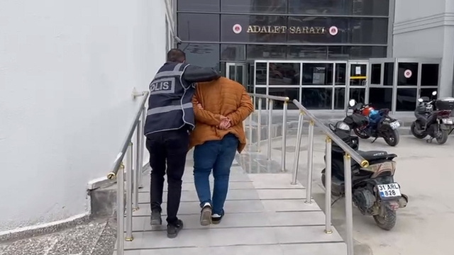 Hatay'da başkasına ait banka kartıyla dolandırıcılık yapan şüpheli tutuklandı