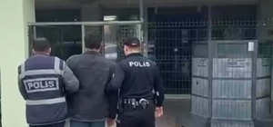 İzmir'de 40 yıl 10 ay hapis cezası bulunan firari göçmen kaçakçısı yakaland...