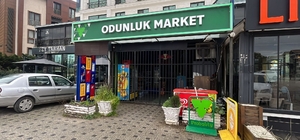 Bursa'da para üstü kavgası kamerada: Market savaş alanına döndü