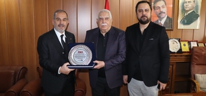 Başkan Alan'dan ekonomiye güç veren isimlere vefa