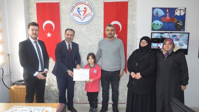 Tavşanlı'da dereceye giren öğrenciye tebrik ziyareti