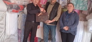 Tavşanlı'da 40 yılı aşkın esnafa ziyaret ve hediye