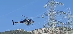 Bodrum'da yüksek gerilim hatları helikopterle temizlendi