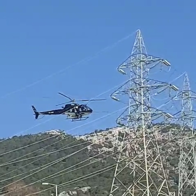 Bodrum'da yüksek gerilim hatları helikopterle temizlendi