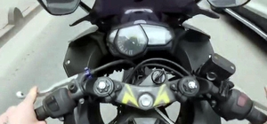 Tek tekerlek üzerinde ilerleyen motosikletin sürücüsüne 71 bin lira ceza