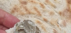 Ekmeğin içerisinden bozuk para halkası çıktı