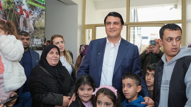 Yılmaz'dan kadın ve çocuklara anlamlı ziyaret
