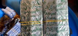 Uyuşturucu hapları kamufle etmek için, ‘Afiyet olsun’ yazılı folyoyla paketlemişler