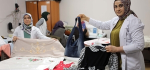 Eski kıyafetler kadınların elinde yeniden kullanılacak duruma getiriliyor