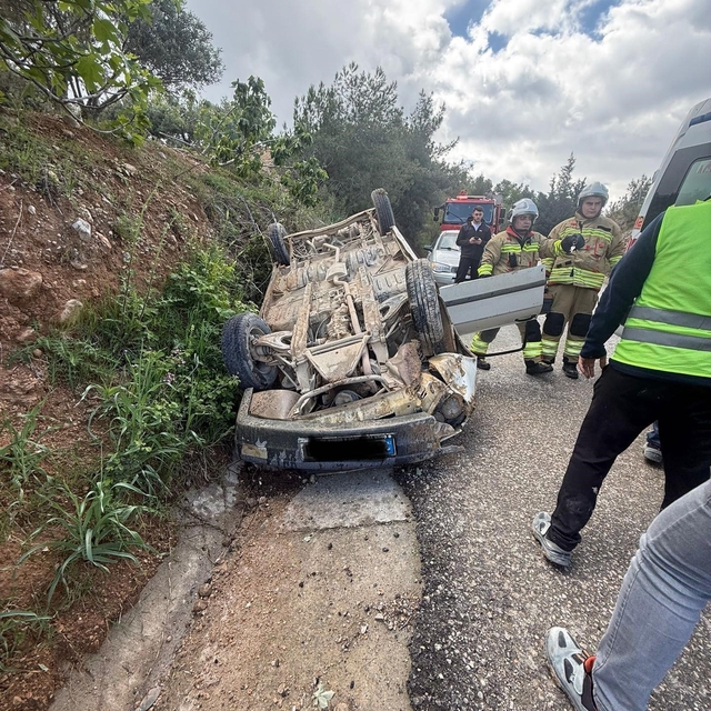 Belen'de otomobil takla attı: 2 yaralı