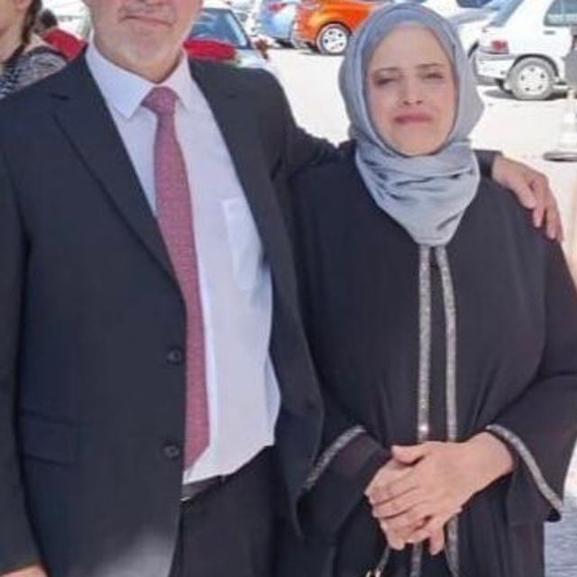 Oğulları tarafından öldürülen veteriner çift, toprağa verildi