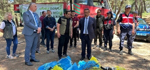 Burhaniye'de orman yangınlarına karşı ormanda çöp toplama etkinliği yapıldı