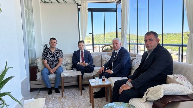 Başkan Karamehmetoğlu şehit aileleriyle buluştu