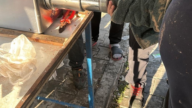 Elini kıyma makinesine kaptıran esnaf yaralandı