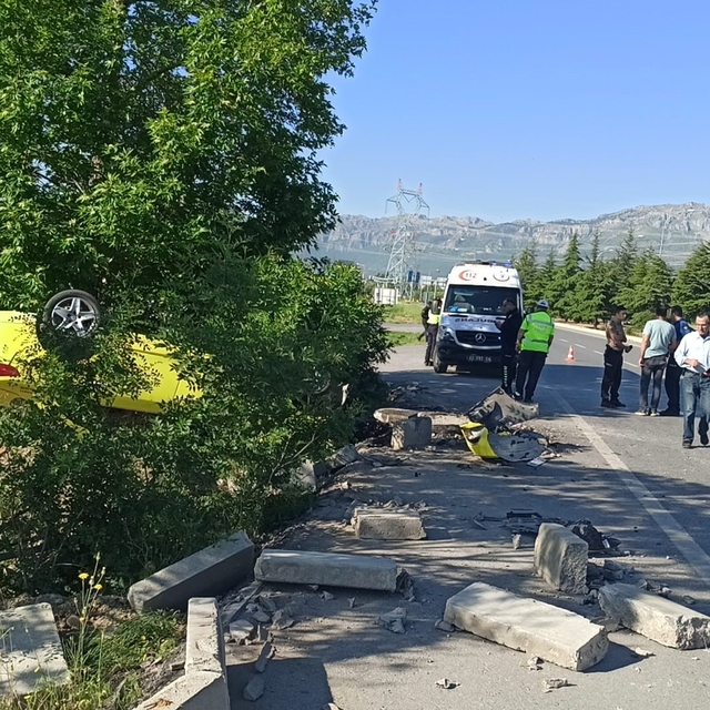 Takla atan otomobilden sürücü yaralı kurtuldu